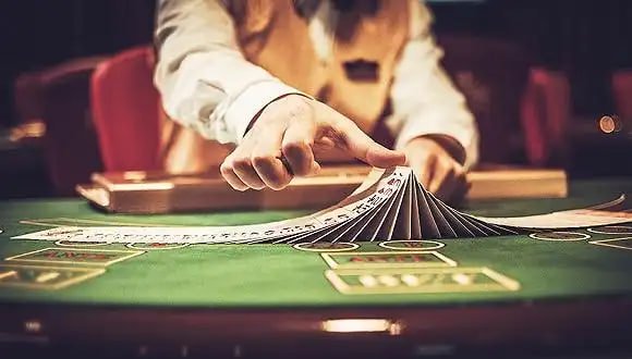 77joya mobile gaming interface showing sports betting and casino games on smartphone